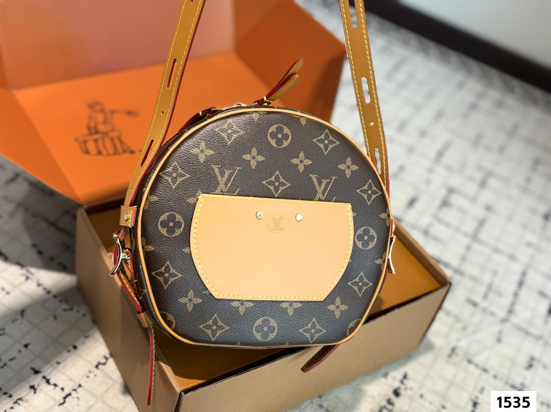 Trendy cowhide round bag