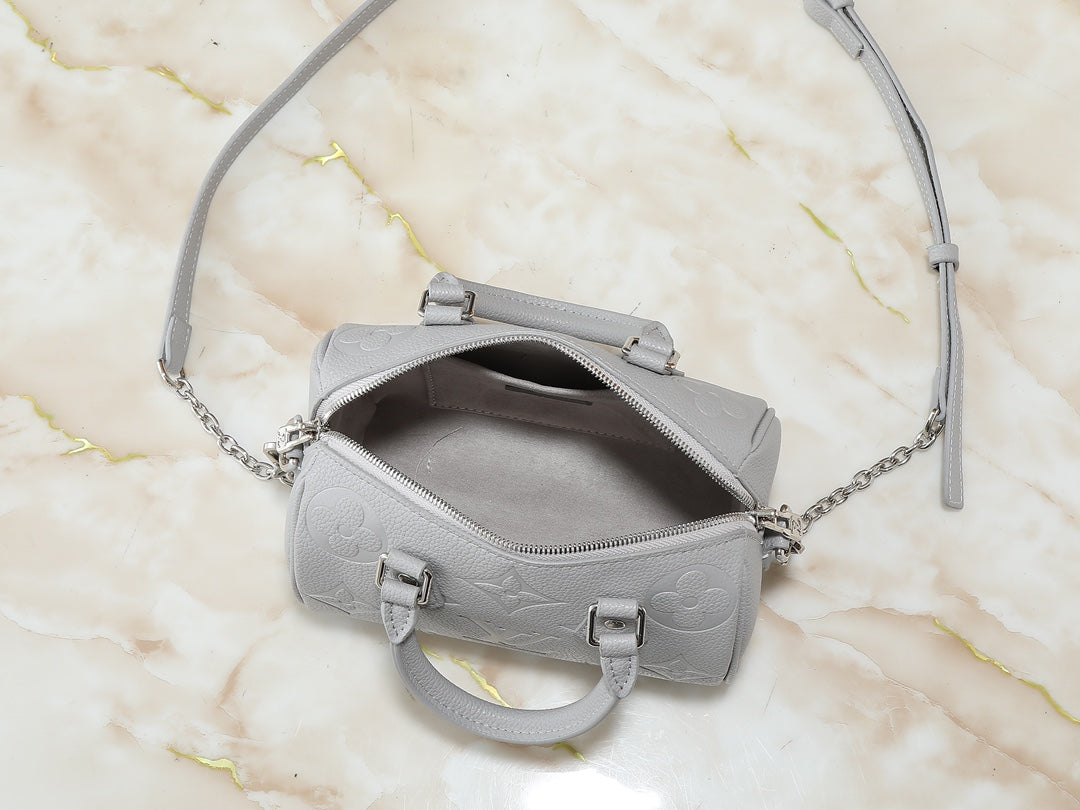 Grey embossed leather bag